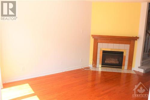 102 Kimberwick Crescent, Ottawa, ON - Indoor Photo Showing Living Room With Fireplace