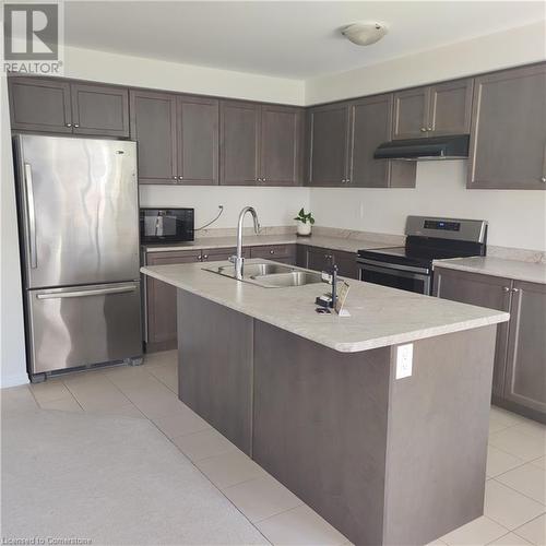 31 Longboat Run W, Brantford, ON - Indoor Photo Showing Kitchen With Double Sink