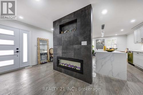 24 Stanbridge Ct Court W, Toronto (Malvern), ON - Indoor Photo Showing Living Room With Fireplace