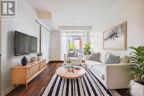 Virtually staged - 429 Kent Street Unit#215, Ottawa, ON - Indoor Photo Showing Living Room