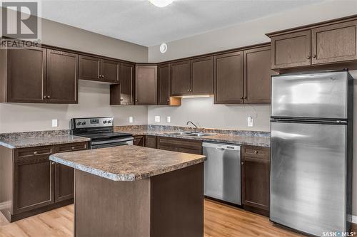 175 2Nd Avenue, Lumsden, SK - Indoor Photo Showing Kitchen With Double Sink