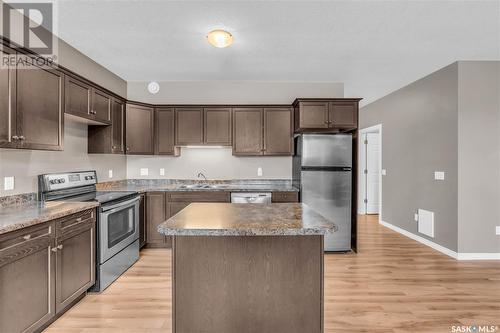 175 2Nd Avenue, Lumsden, SK - Indoor Photo Showing Kitchen With Double Sink