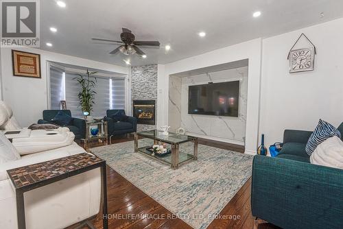 28 Bowsfield Drive, Brampton (Vales Of Castlemore), ON - Indoor Photo Showing Living Room With Fireplace