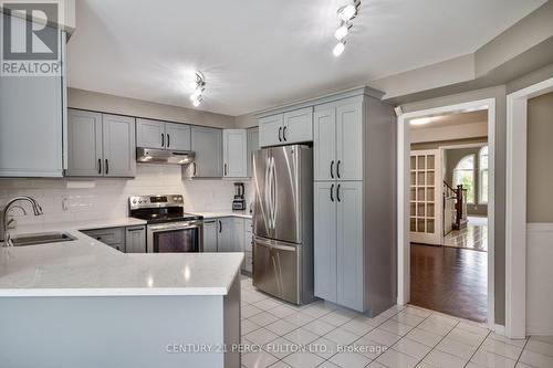 54 Cityview Circle E, Barrie, ON - Indoor Photo Showing Kitchen With Double Sink