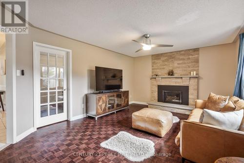 54 Cityview Circle E, Barrie, ON - Indoor Photo Showing Living Room With Fireplace