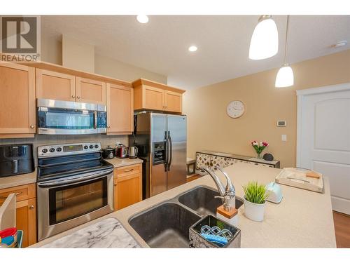 3313 Wilson Street Unit# 203, Penticton, BC - Indoor Photo Showing Kitchen With Double Sink