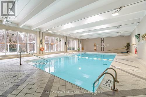 1001 - 3695 Kaneff Crescent, Mississauga, ON - Indoor Photo Showing Other Room With In Ground Pool