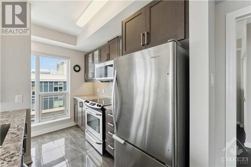 Kitchen/Den - 195 Besserer Street Unit#Ph-2806, Ottawa, ON - Indoor Photo Showing Kitchen With Upgraded Kitchen