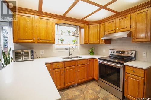 906 Nesslin Crescent, Saskatoon, SK - Indoor Photo Showing Kitchen With Double Sink