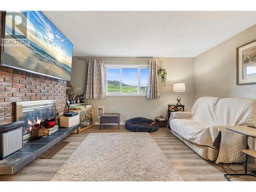 2197 Gallagher Road, Kelowna, BC - Indoor Photo Showing Living Room With Fireplace