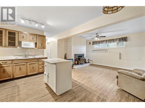 2197 Gallagher Road, Kelowna, BC - Indoor Photo Showing Other Room With Fireplace