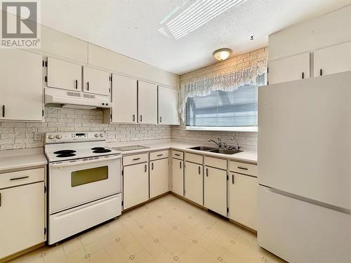 107 Ridgewood Drive, Princeton, BC - Indoor Photo Showing Kitchen With Double Sink