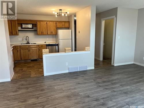 B 1159 Taisey Crescent, Estevan, SK - Indoor Photo Showing Kitchen With Double Sink