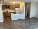 B 1159 Taisey Crescent, Estevan, SK  - Indoor Photo Showing Kitchen With Double Sink 