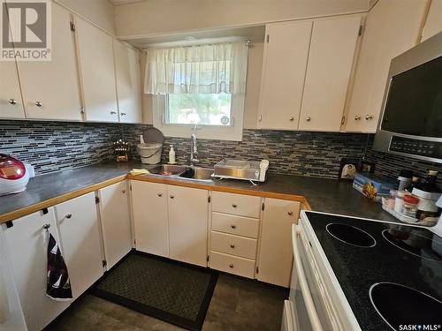 5730 2Nd Avenue N, Regina, SK - Indoor Photo Showing Kitchen With Double Sink