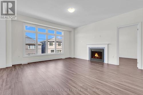 26 Hearn Street, Bradford West Gwillimbury, ON - Indoor Photo Showing Living Room With Fireplace