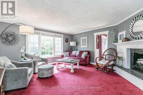 1519 1 Line N, Oro-Medonte, ON - Indoor Photo Showing Living Room With Fireplace