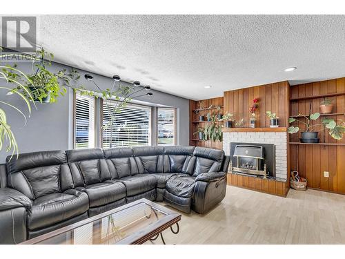 3904 Bellamy Road, Prince George, BC - Indoor Photo Showing Living Room With Fireplace