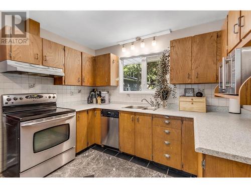 3904 Bellamy Road, Prince George, BC - Indoor Photo Showing Kitchen With Double Sink