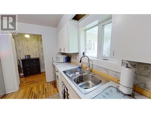 7676 255 Road, Fort St. John, BC - Indoor Photo Showing Kitchen With Double Sink