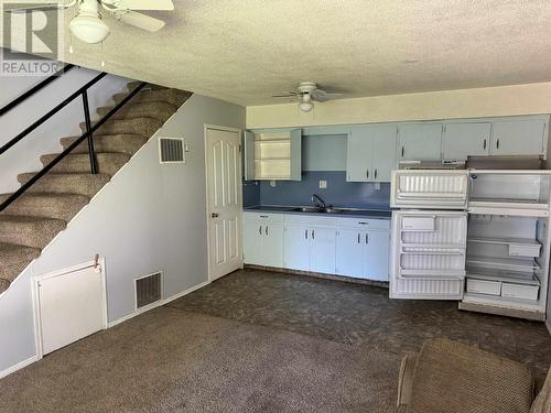 7676 255 Road, Fort St. John, BC - Indoor Photo Showing Kitchen With Double Sink