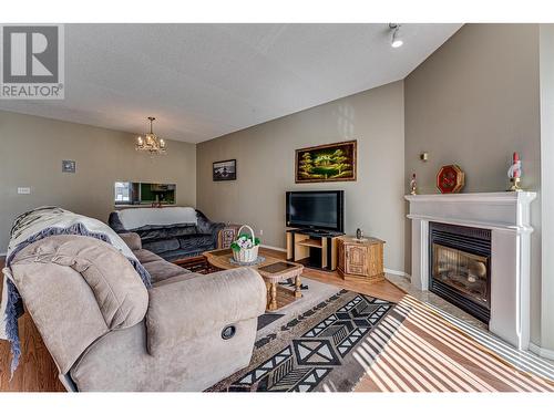 4740 20 Street Unit# 15, Vernon, BC - Indoor Photo Showing Living Room With Fireplace