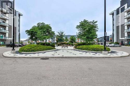 423 - 102 Grovewood Common, Oakville, ON - Outdoor With Balcony