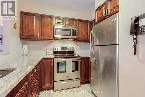 312 - 2177 Burnhamthorpe Road W, Mississauga (Erin Mills), ON - Indoor Photo Showing Kitchen