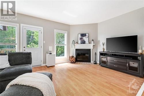 21 Lightfoot Place, Ottawa, ON - Indoor Photo Showing Living Room With Fireplace