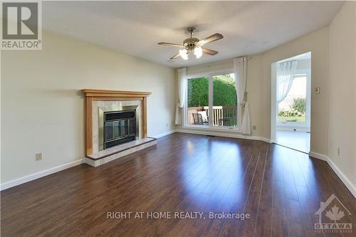 4 Balding Crescent, Ottawa, ON - Indoor Photo Showing Living Room With Fireplace