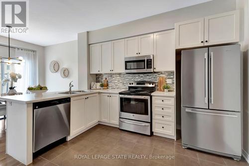 35 - 45 Royal Winter Drive, Hamilton (Binbrook), ON - Indoor Photo Showing Kitchen With Stainless Steel Kitchen With Double Sink