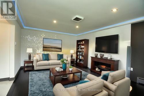 3836 Brookside Drive, West Lincoln, ON - Indoor Photo Showing Living Room With Fireplace