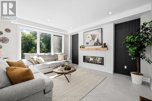 114 Colver Street W, West Lincoln, ON - Indoor Photo Showing Living Room With Fireplace