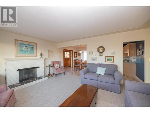 3975 Todd Road, Kelowna, BC - Indoor Photo Showing Living Room With Fireplace