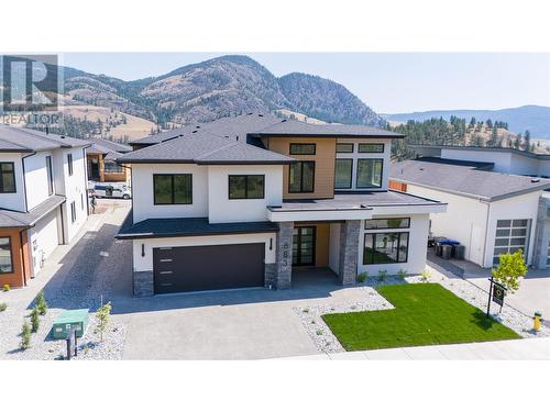 883 Loseth Drive, Kelowna, BC - Outdoor With Facade