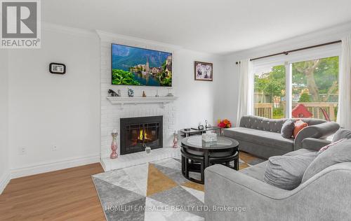 82 Northampton Street, Brampton (Westgate), ON - Indoor Photo Showing Living Room With Fireplace