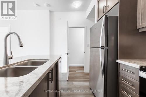 1001 - 470 Dundas Street E, Hamilton (Waterdown), ON - Indoor Photo Showing Kitchen With Double Sink