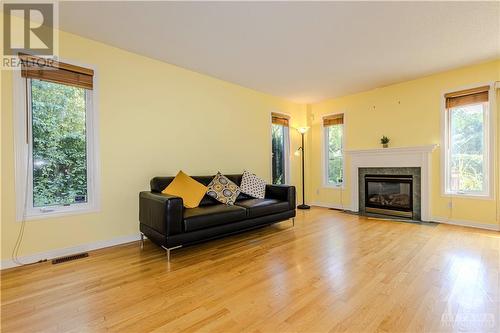 Spacious Living Room with gas fireplace - 221 Station Boulevard Unit#11, Ottawa, ON - Indoor Photo Showing Living Room With Fireplace