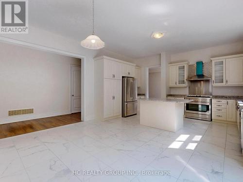 15 Trail Boulevard, Springwater, ON - Indoor Photo Showing Kitchen