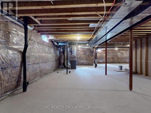 15 Trail Boulevard, Springwater, ON - Indoor Photo Showing Basement