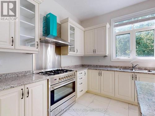 15 Trail Boulevard, Springwater (Minesing), ON - Indoor Photo Showing Kitchen With Double Sink