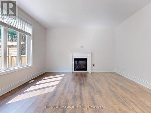 15 Trail Boulevard, Springwater, ON - Indoor Photo Showing Living Room With Fireplace