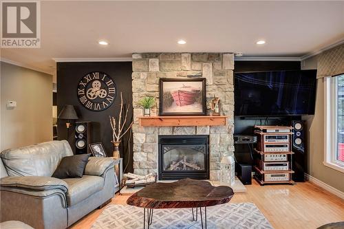 171 Du Lac Avenue, Lavigne, ON - Indoor Photo Showing Living Room With Fireplace