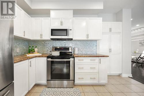 50 Tudor Crescent, Barrie (Innis-Shore), ON - Indoor Photo Showing Kitchen With Upgraded Kitchen