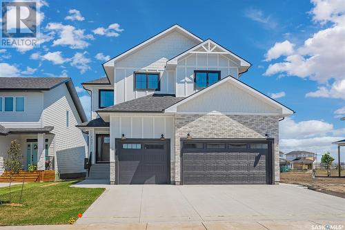 107 Woolf Bend, Saskatoon, SK - Outdoor With Facade