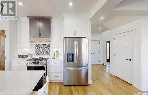 107 Woolf Bend, Saskatoon, SK - Indoor Photo Showing Kitchen With Upgraded Kitchen