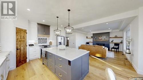 107 Woolf Bend, Saskatoon, SK - Indoor Photo Showing Kitchen With Upgraded Kitchen