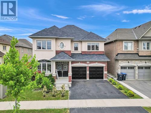 125 Russell Creek Drive, Brampton (Sandringham-Wellington North), ON - Outdoor With Facade