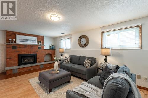 79 Roundhill Court, London, ON - Indoor Photo Showing Living Room With Fireplace