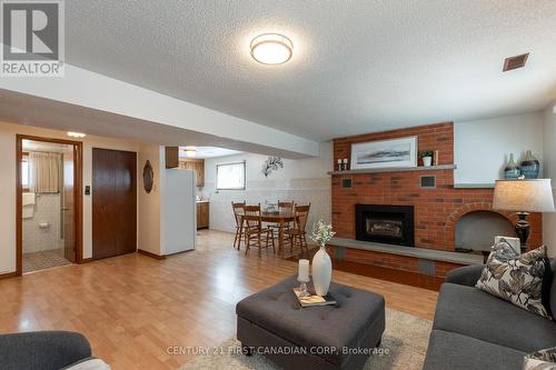 79 Roundhill Court, London, ON - Indoor Photo Showing Living Room With Fireplace